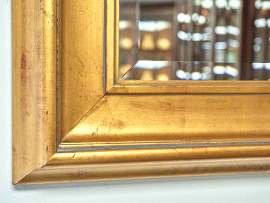 Beveled Mirror in Gold Frame with Red Undertones