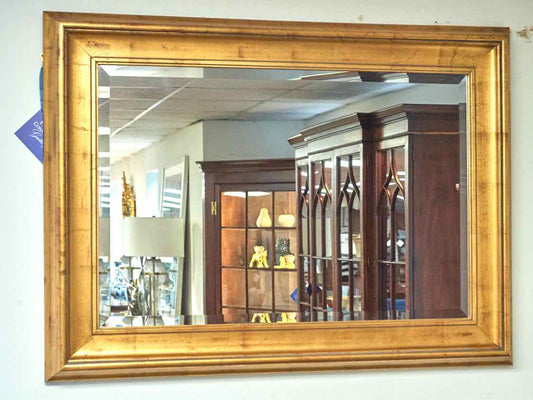 Beveled Mirror in Gold Frame with Red Undertones