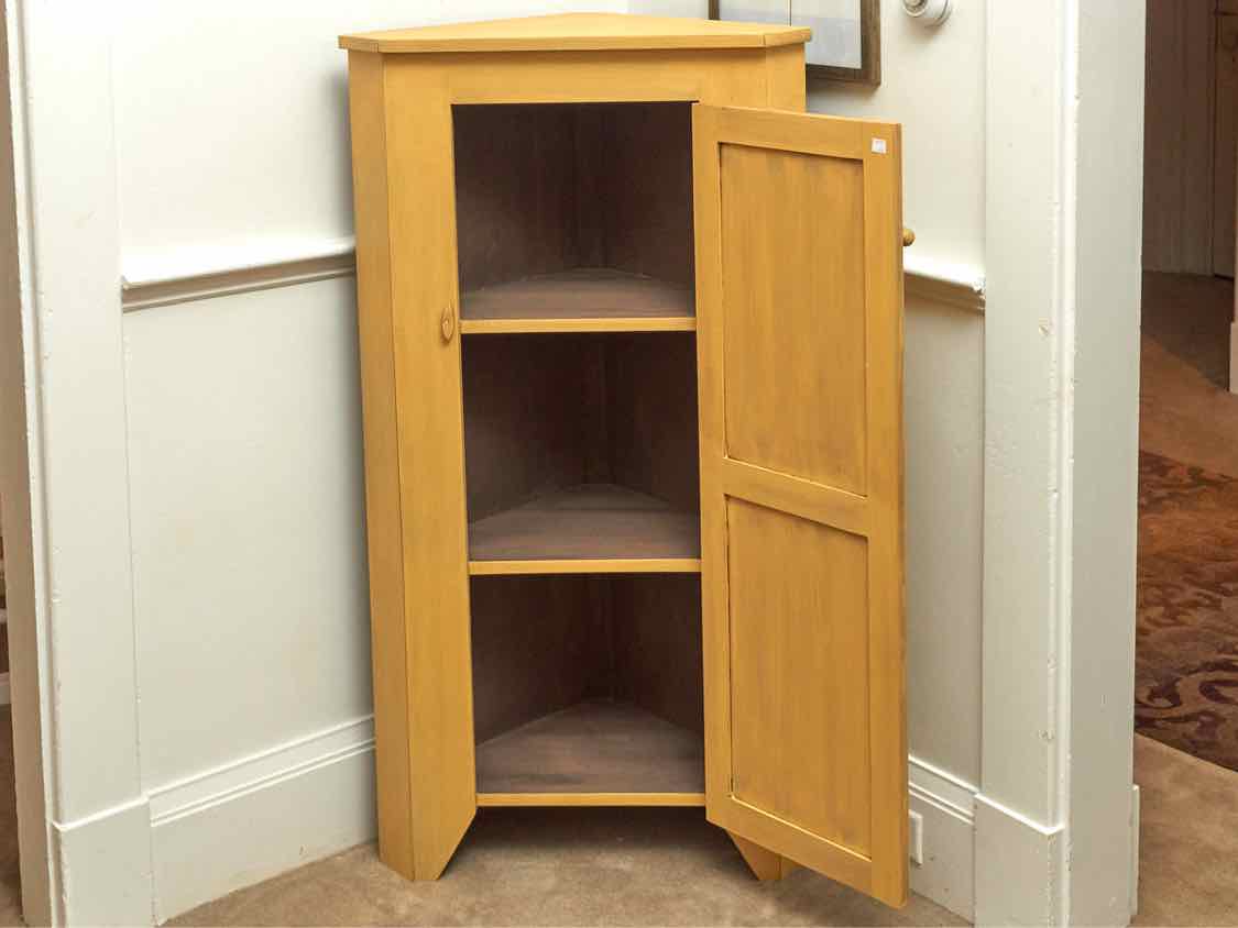 Corner Cabinet with Raised Panel Door in Butter Yellow Finish