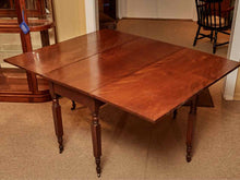 Antique Cherry Drop Leaf With Turned Legs On Casters Dining Table