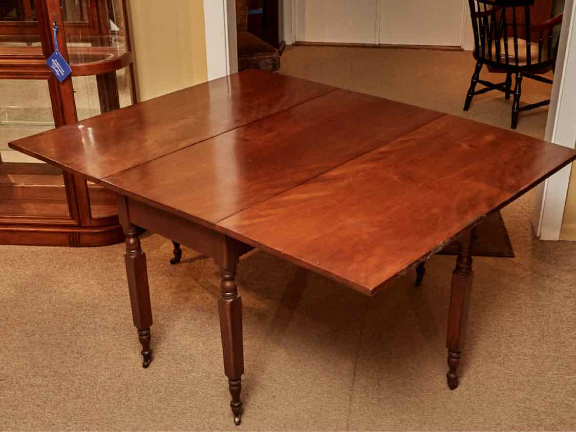 Antique Cherry Drop Leaf With Turned Legs On Casters Dining Table