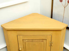 Corner Cabinet with Raised Panel Door in Butter Yellow Finish