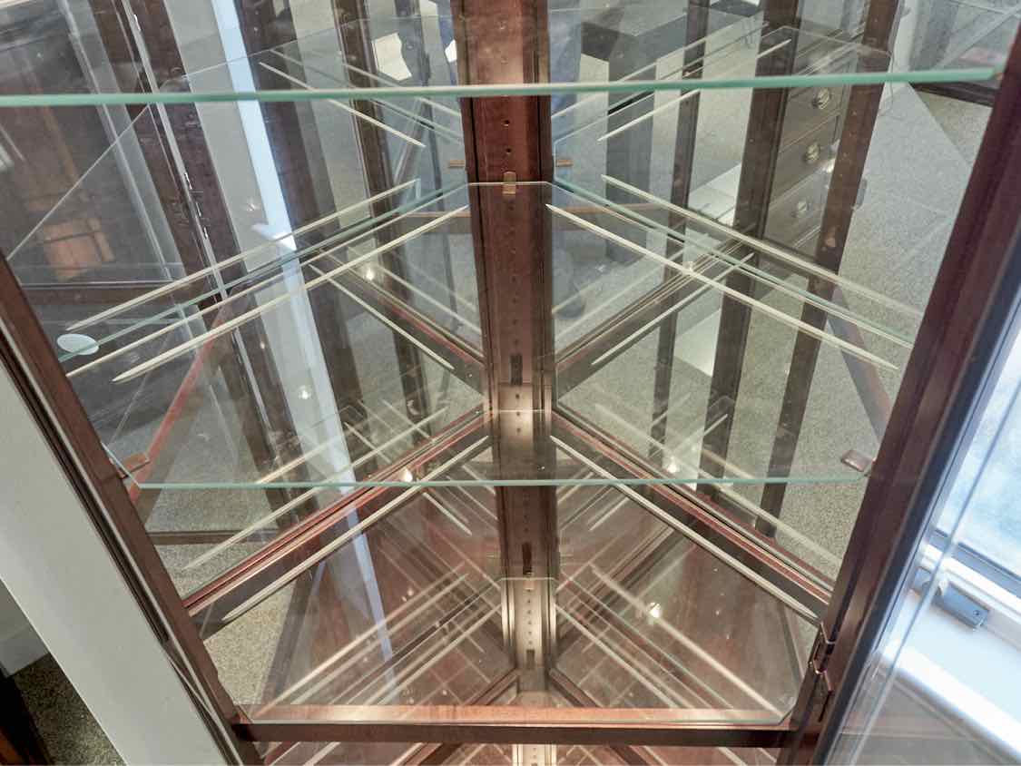 Howard Miller Cherry Lighted Corner Cabinet