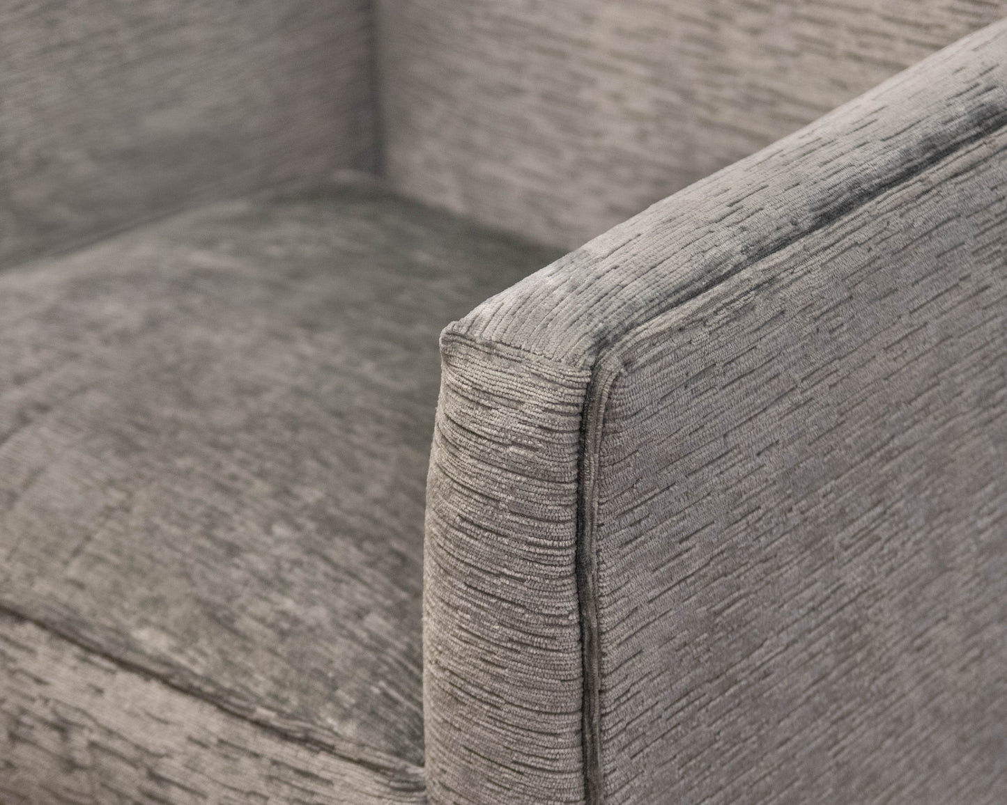 Basset Swivel Chair Upholstered In Grey Chenille Fabric