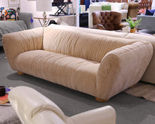 Beige Sofa With Loose Fold Design