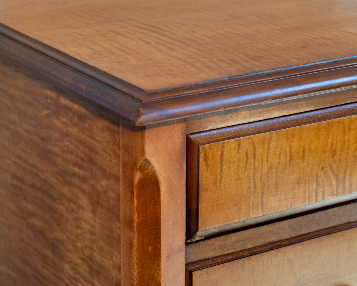 Tiger Maple 4-Drawer Chest with Wood Pulls and Turned Feet