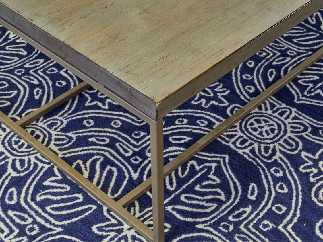 Lorts Driftwood Finish Top Cocktail Table with Taupe Metal Base