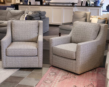 Pair of Universal Swivel Chairs