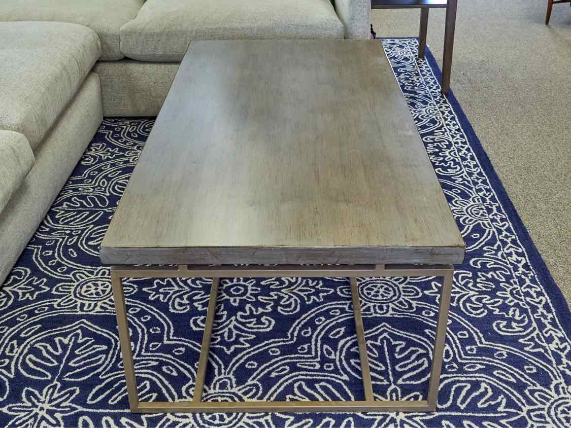 Lorts Driftwood Finish Top Cocktail Table with Taupe Metal Base