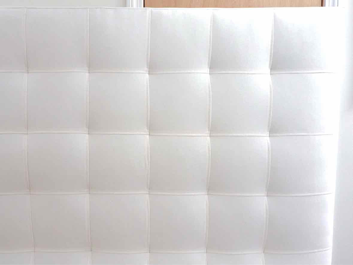 White Upholstered Queen Bed with Quilt Design Back Headboard