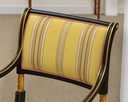 Pair of Regency Ebonized Arm Chairs with Gold Trim & Striped Yellow Silk