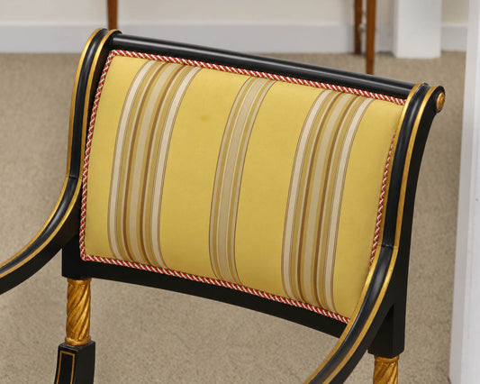 Pair of Regency Ebonized Arm Chairs with Gold Trim & Striped Yellow Silk