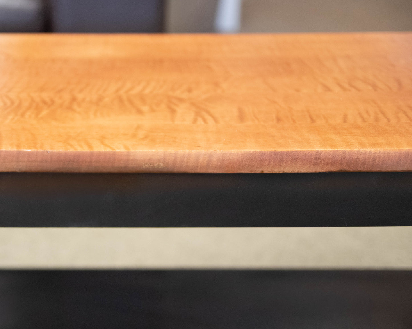 Tiger Maple Top Cocktail Table with Black Finish Spool Leg Base
