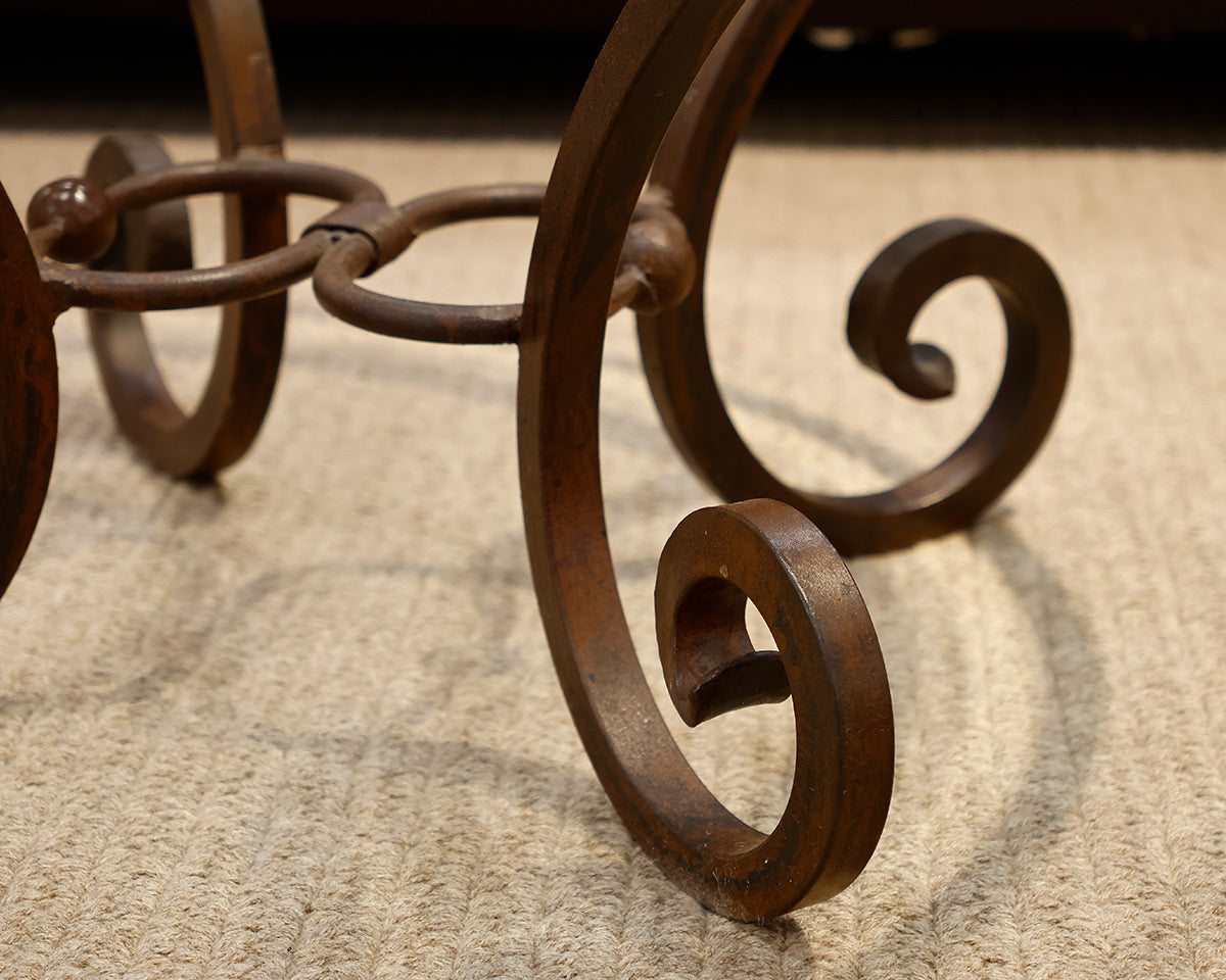 Comina Round Glass and Iron Scroll Base Cocktail Table