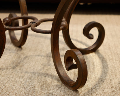 Comina Round Glass and Iron Scroll Base Cocktail Table