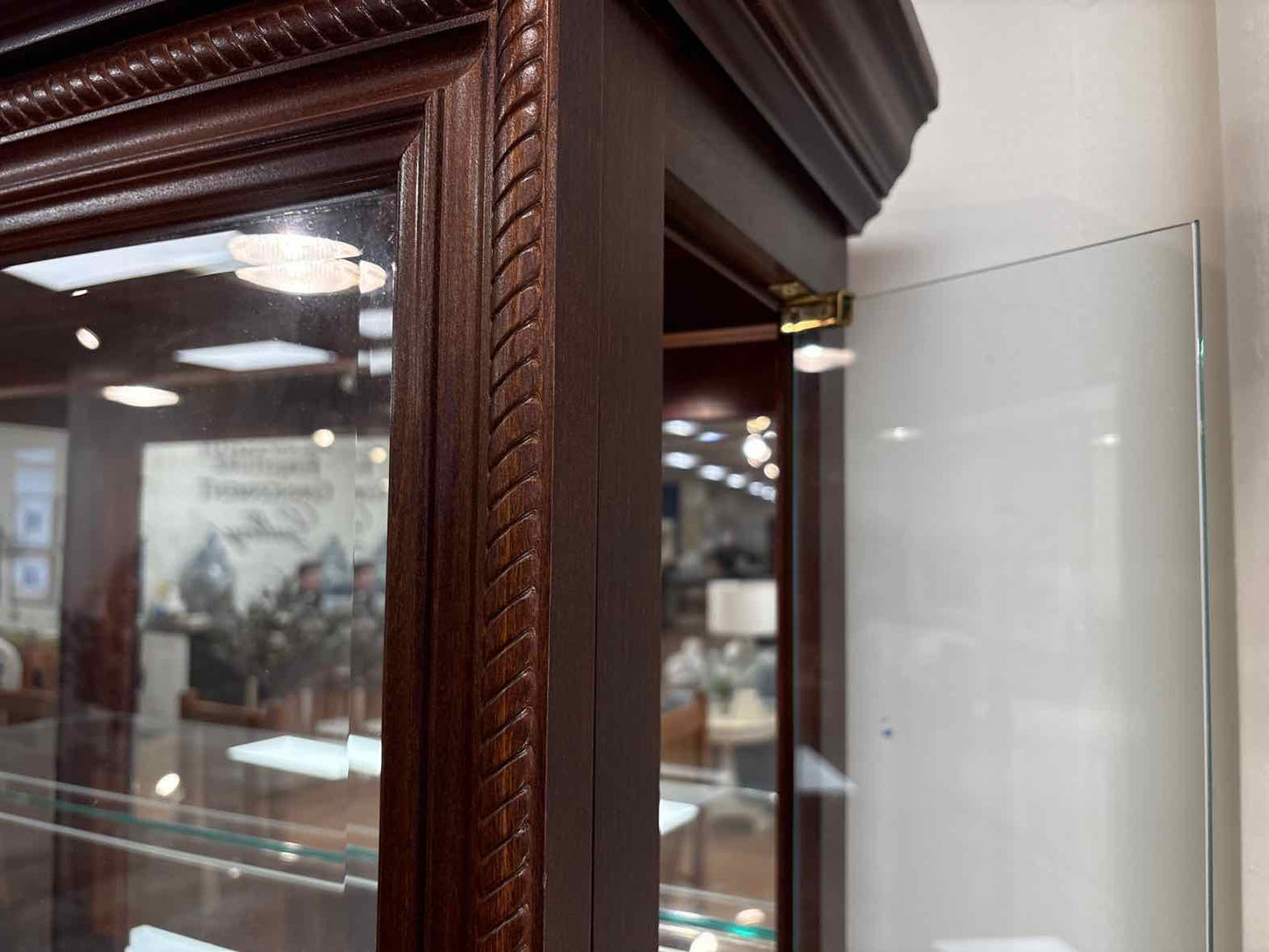 Pulaski Lighted Side Entry Curio Cabinet in Cherry