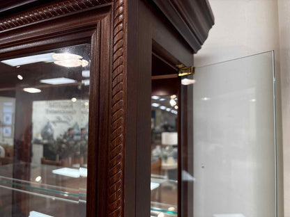 Pulaski Lighted Side Entry Curio Cabinet in Cherry