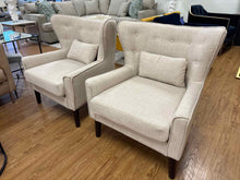 Pair of Tufted Wingback Chairs