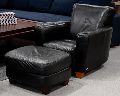 Natuzzi Black Leather Chair and Ottoman