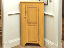 Corner Cabinet with Raised Panel Door in Butter Yellow Finish