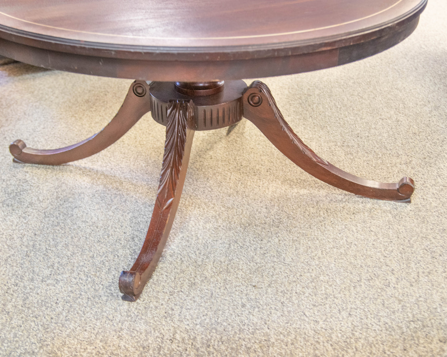 Mahogany Round Cocktail Table on Carved Leg Pedestal  Base