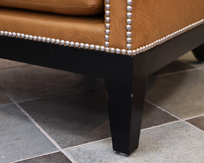 Ironies Tule Lounge Chair in Saddle Leather with Silver Nailhead Trim