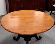 Round Wooden Pedestal Dining Table