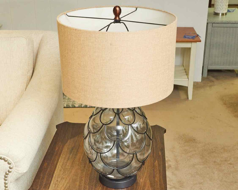 Clear Glass Globe With Black Metal Design &  Sand Color Shade Table Lamp
