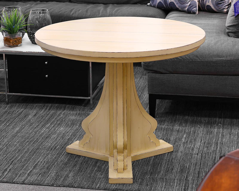 Pale Yellow Round Bistro Table on Scalloped Pedestal