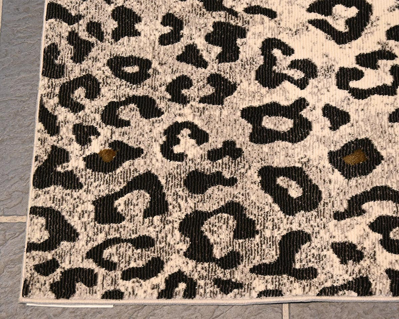Evolution Collection Black & Ivory Leopard Area Rugs