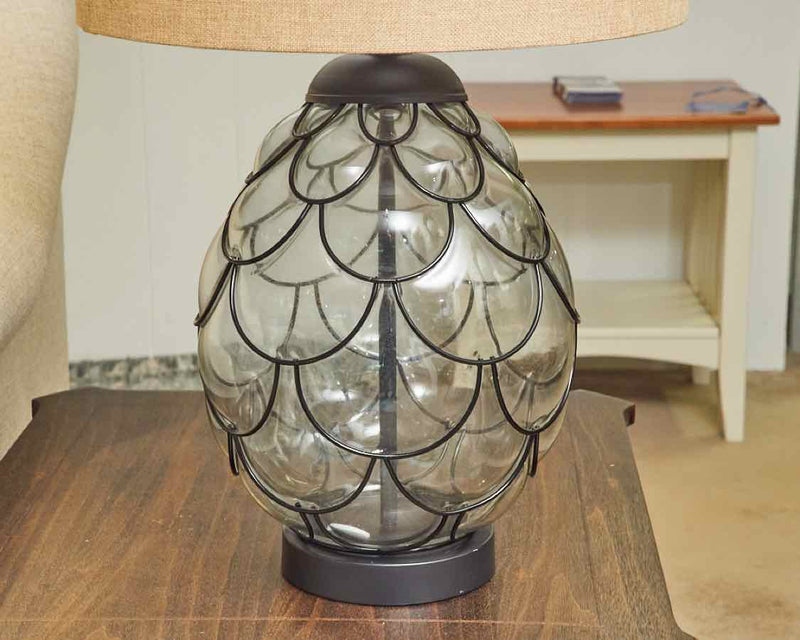 Clear Glass Globe With Black Metal Design &  Sand Color Shade Table Lamp