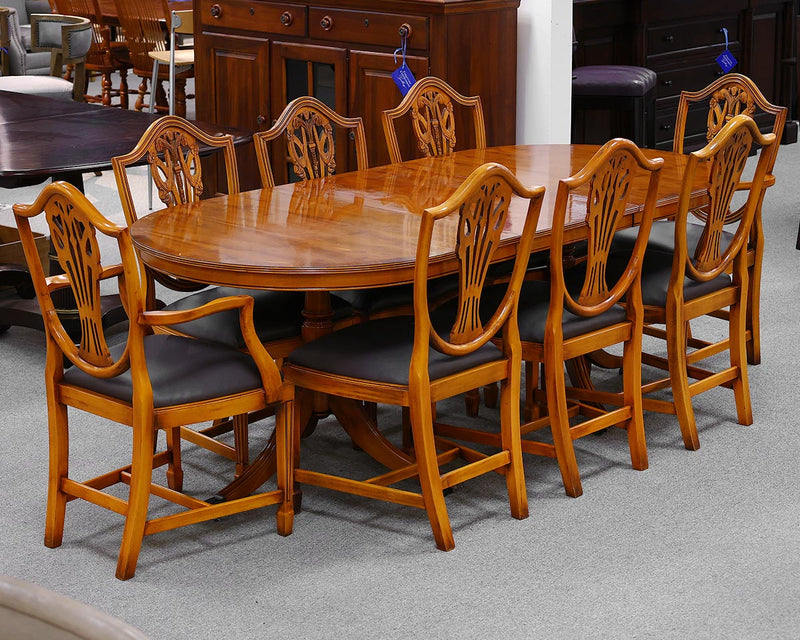 Yew Wood Dining Set with 2 leaves, table pads &  8 Carved Shield Back Chairs