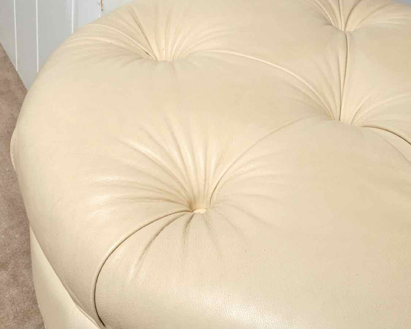 Ivory Tufted Leather Ottoman with Nickel Nailhead & Casters